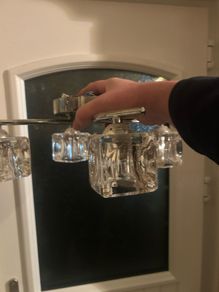 ceiling light with square glass around the bulbs