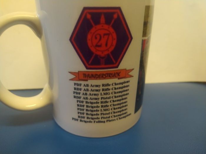 Two Irish Defence Forces mugs