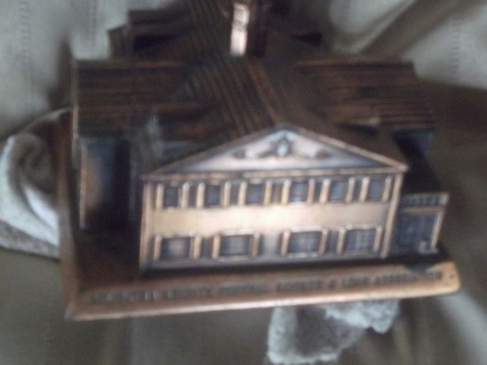 a vintage saving money box for arlington height federal savings