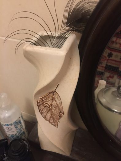 beautiful cream wave and twist leaf vase