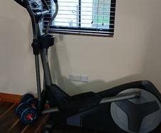NordicTrack Elliptical + York Dumbbell Rack