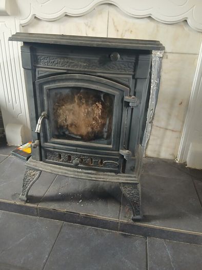 solid fuel stove heat blower and childproof fence