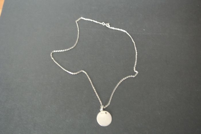 Silver Chain And Silver Disc.