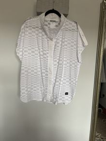 Naya white sleeveless blouse