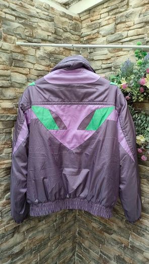 Vintage Descente 1980s ski jacket Official supplier of the Suisse ski team This is a rare and unique piece The quality and finish on the jacket is extremely high  It's in mint condition for its age Size medium