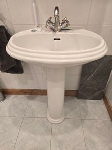 Toilet and sink with pedestal
