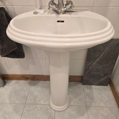 Toilet and sink with pedestal