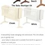 Baby swinging crib Image 4