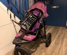 Single out n about buggy with buggy board attached