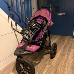 Single out n about buggy with buggy board attached