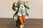 Porcelain Figurine Bisque Colonial Boy in Waistcoat Holding Bird Cage Arnart