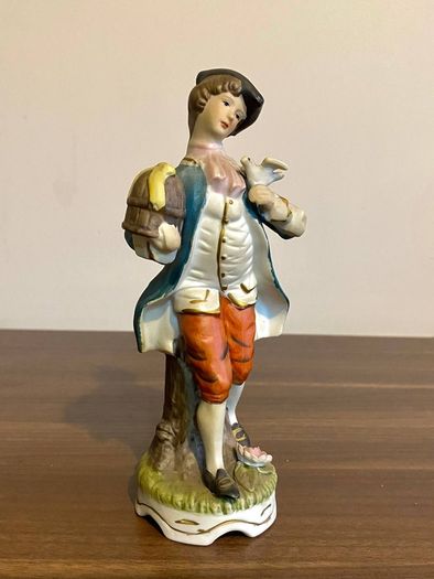 Porcelain Figurine Bisque Colonial Boy in Waistcoat Holding Bird Cage Arnart