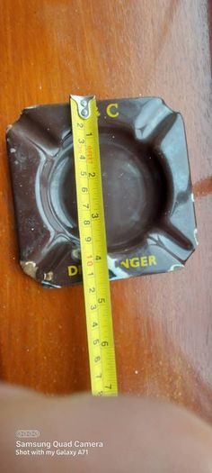 C & C Dry Ginger "ale" enamel metal ashtray ,dark brown,  very old vintage advertising ashtray, hard to come by ,collectors item,used condition  see pictures