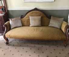Antique Victorian camelback parlour sofa