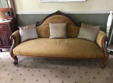 Antique Victorian camelback parlour sofa