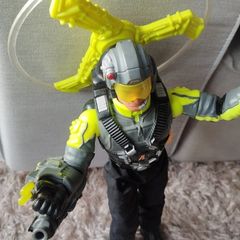 Limited edition This Action Man Air Patrol figure from Hasbro is a 12-inch electronic toy featuring a propeller backpack.The figure wears a distinctive neon yellow and gray flight suit and includes a helmet with a yellow visor.