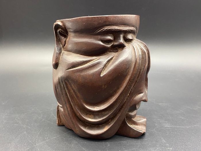 Chinese carved hardwood brush pot, carved with a Chinese Man