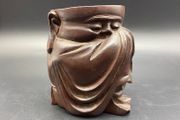 Chinese carved hardwood brush pot, carved with a Chinese Man