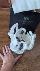 Newbridge home sculpted candle holder and candle.  Brand new in box.