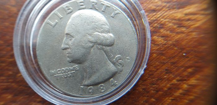 Rare 1984 Quarter Dollar Error, with error in the D