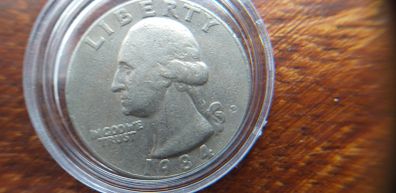 Rare 1984 Quarter Dollar Error, with error in the D