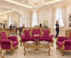 Old three piece salon set that has been recovered and the gilt gold has been redone
