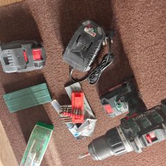 parkside drill + 2 batteries+ charger+ bits + drill bits