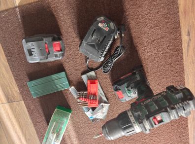 parkside drill + 2 batteries+ charger+ bits + drill bits