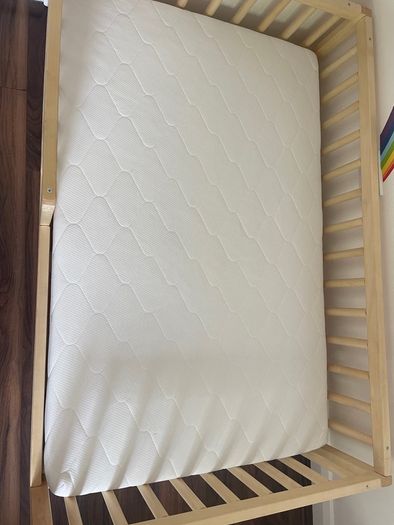 Gorgeous wooden toddler bed and brand new unused high quality mattress