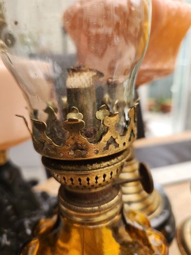 four vintage working oil lamps