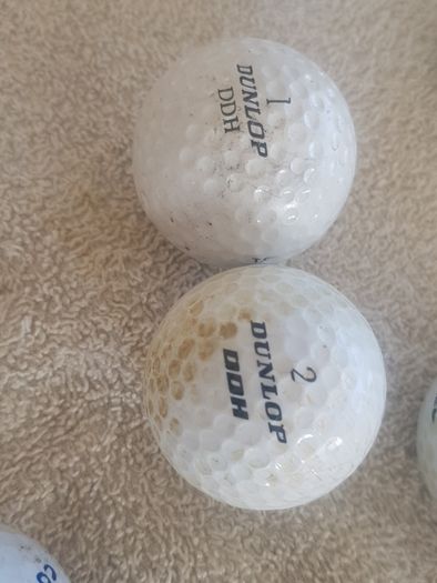 golf ball and tees