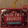 festive "Wash Your Baubles" soap on a rope Image 2