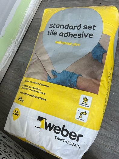 3 boxes tiles and adhesive
