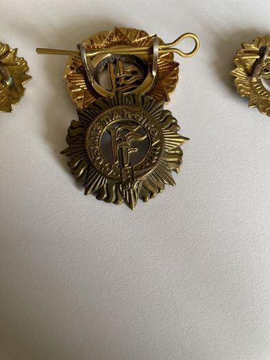 Irish Army cap badges three brass one staybrite