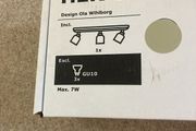 Ceiling track lights. Ikea Hektar in beige.