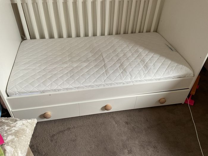 ikea cot bed white , one long drawer ideal for books