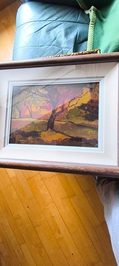 Framed under glass oil panting on board of land scape signed M.M KENNA