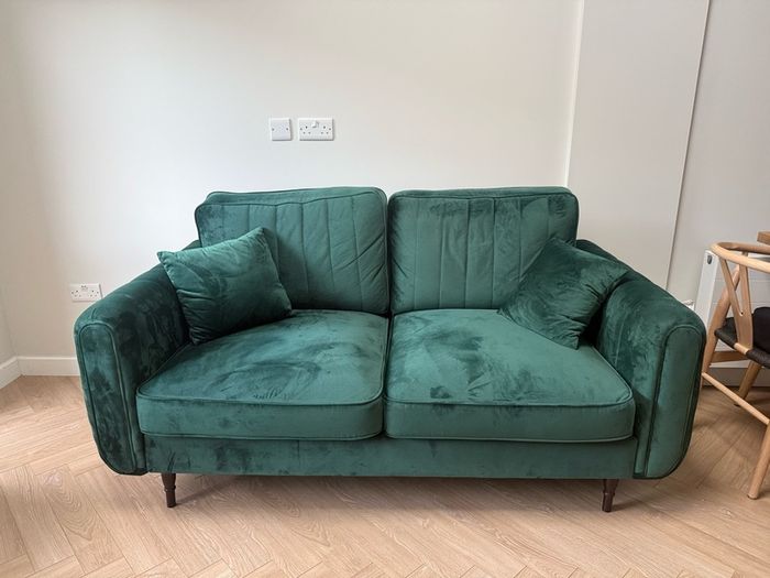 Green velvet sofa