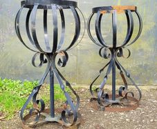 Vintage pair of wrought iron garden basket planters