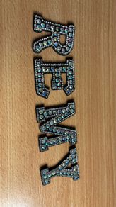 REMY name badge letters