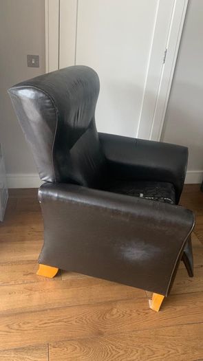 Bespoke solid armchair in need of repair