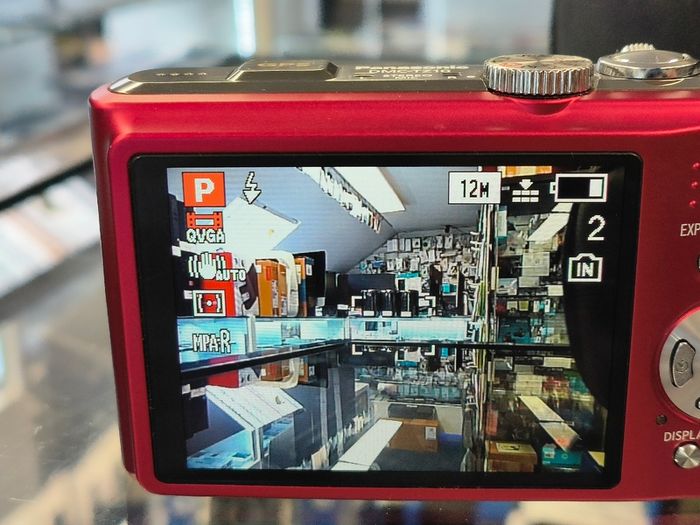 Panasonic LUMIX DMC-TZ10 12.1MP Digital Camera 12x Optical Zoom Red/ Excellent