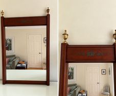 Mirror with brass urn shaped finials