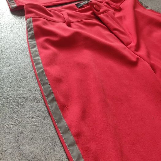Red trousers and top set
