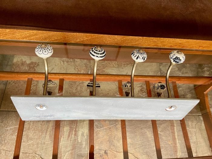 New Unused Stylish Entryway Mounted Ceramic and Brass Coat Hanger