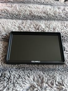 Feelworld external camera monitor in excellent working condition.