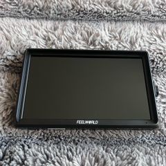 Feelworld external camera monitor in excellent working condition.