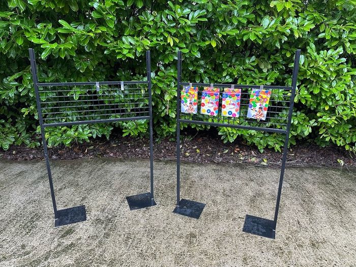 Black Grid Wall Shop Display Stand - Signage Space Above