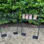Black Grid Wall Shop Display Stand - Signage Space Above Image 3