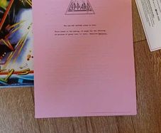 Def Leppard LP with original UK press release (1987)